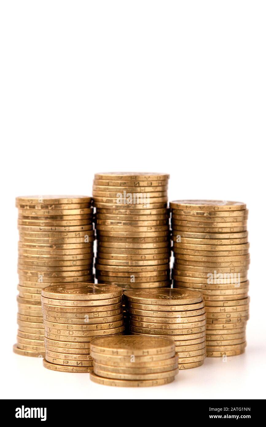 Stack of golden coins isolated on white background Stock Photo - Alamy