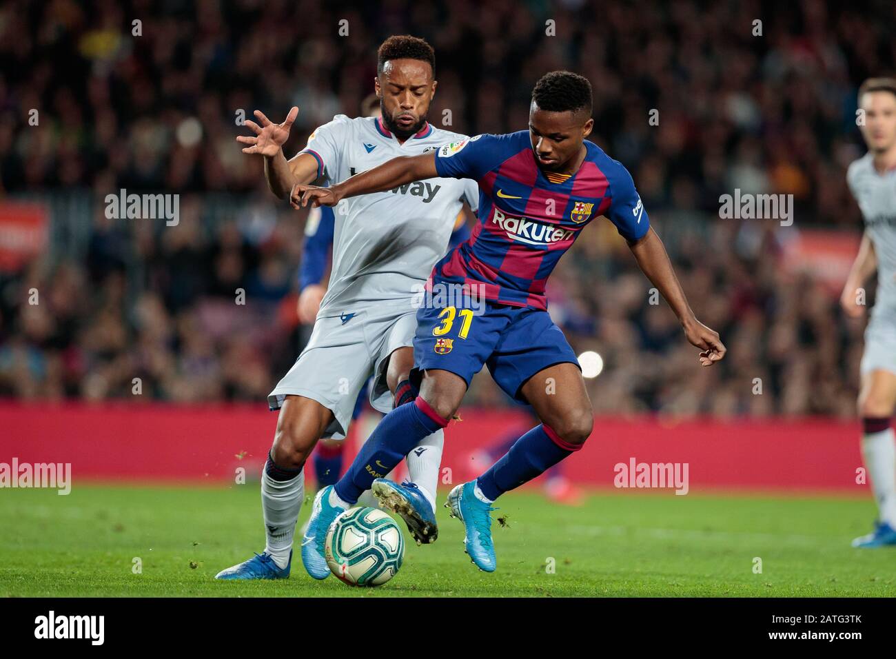 Barcelona, Spain. 02nd Feb, 2020. BARCELONA, SPAIN - FEBRUARY 02: Hernani of Levante UD fights a ball with Ansu Fati of FC Barcelona during the Liga match between FC Barcelona and Levante UD at Camp Nou on February 02, 2020 in Barcelona, Spain. Credit: Dax Images/Alamy Live News Stock Photo