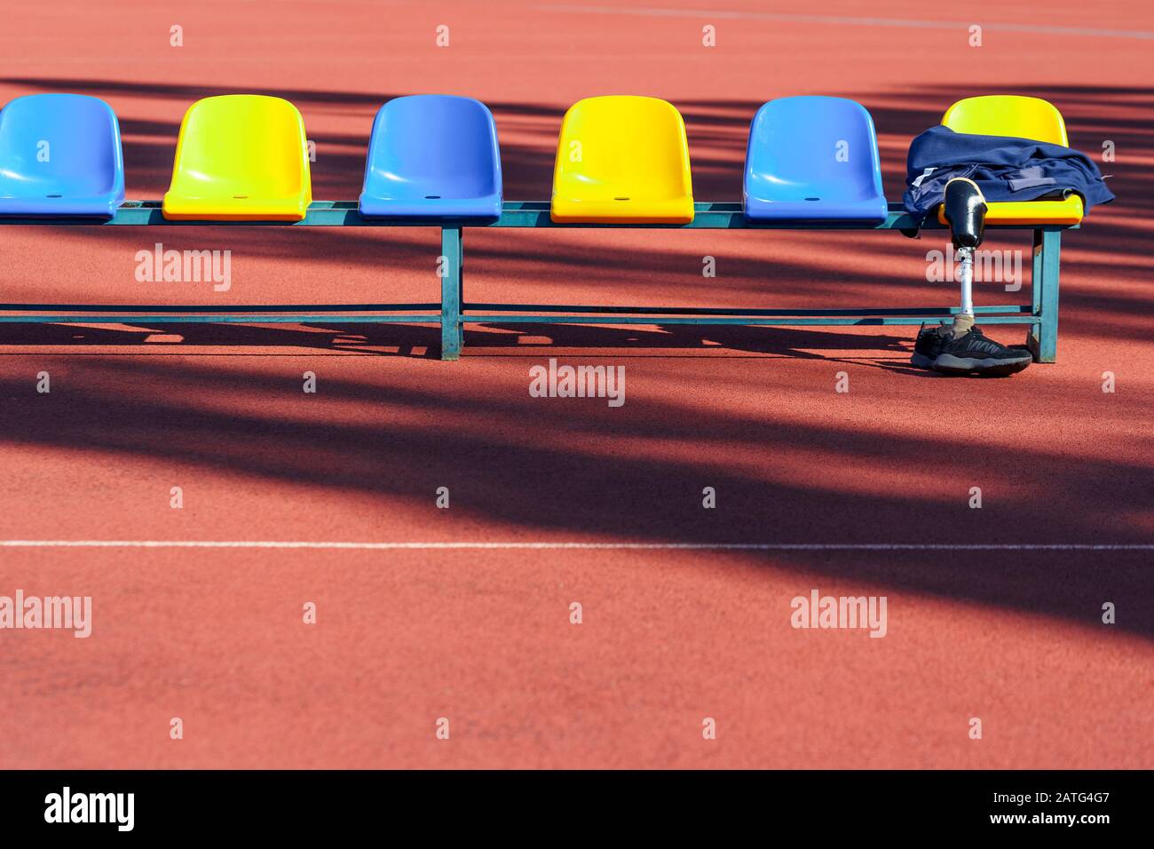 Sportsman clothes on a seat at the stadium Stock Photo Alamy