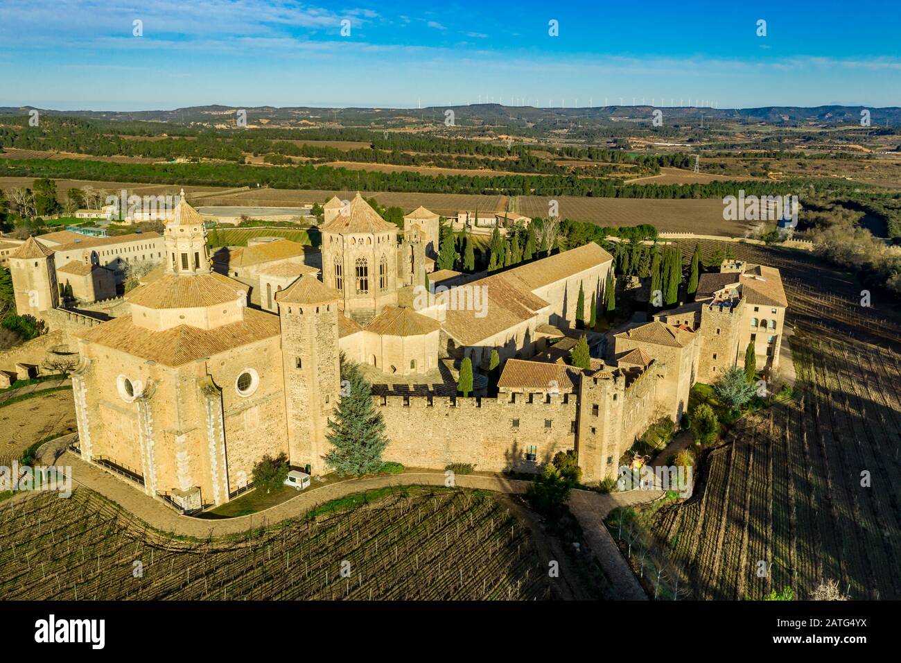 Aerial view of the Royal Abbey of Santa Maria de Poblet a Cistercian fortified monastery, founded in 1151 in Catalunya Spain Stock Photo