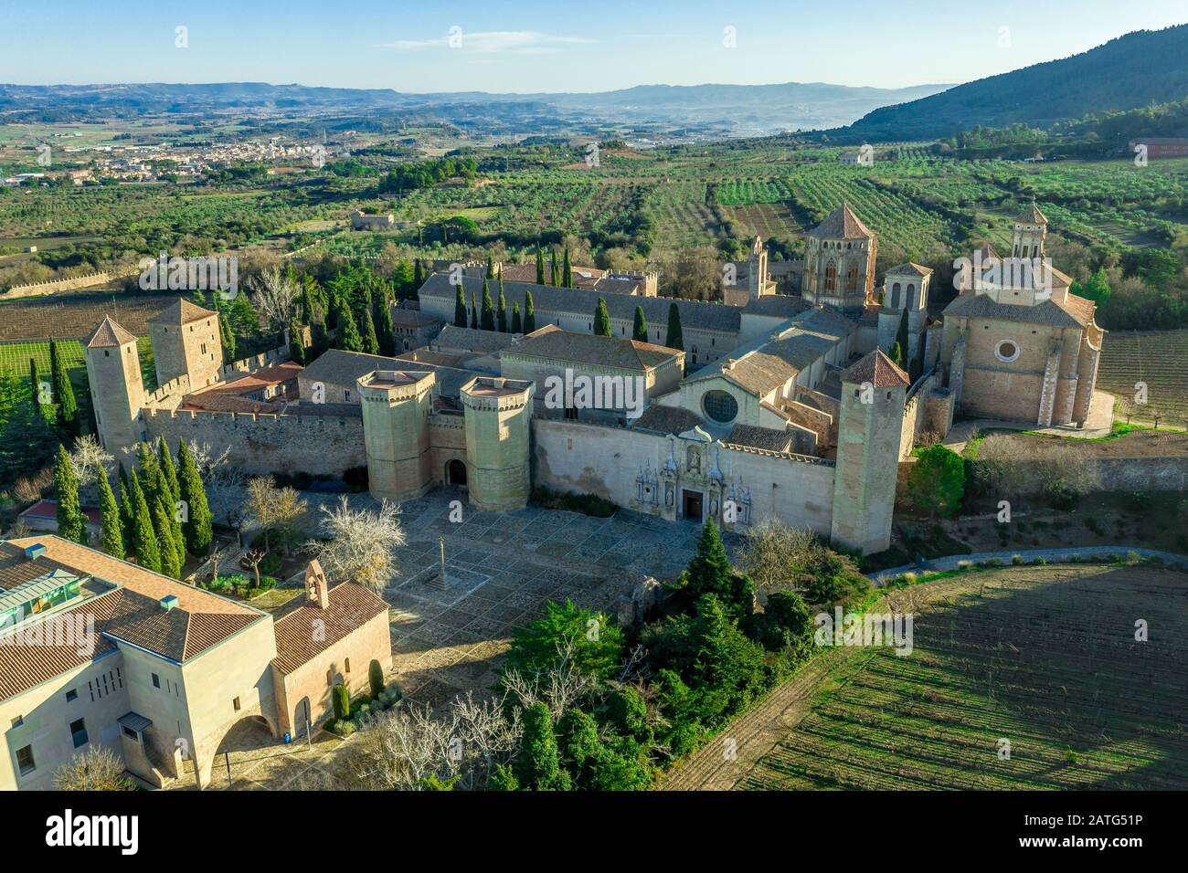 Aerial view of the Royal Abbey of Santa Maria de Poblet a Cistercian fortified monastery, founded in 1151 in Catalunya Spain Stock Photo