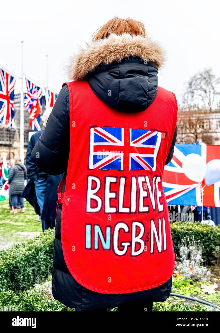Brexit celebrations 31st January 2020 in Whitehall and Parliament Square, London UK - Brexeteers wearing Union Jack clothing Believe in GB and NI Stock Photo