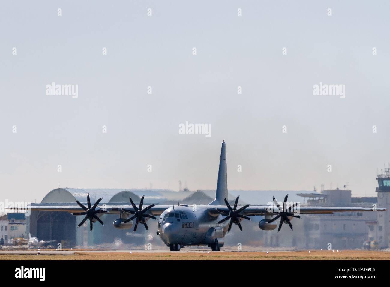 An 8 -bladed propellor version of a Lockheed KC-130T Hercules transport aircraft with the VR-55 Fleet Logistical Support Squadron (The Minutemen) NAF Atsugi, Japan Stock Photo