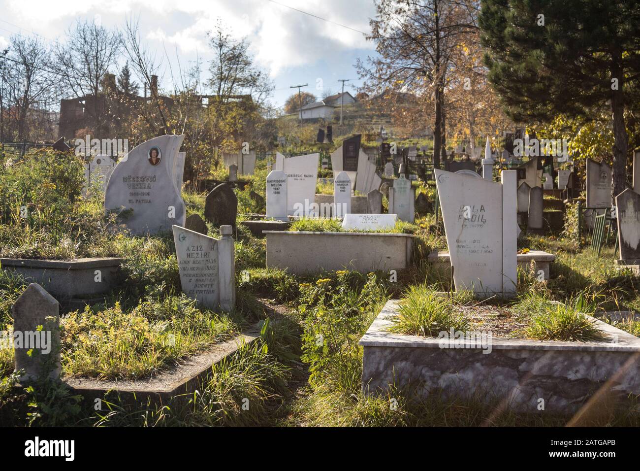 MITROVICA, KOSOVO - NOVEMBER 11, 2016: Graves in the bosniak muslim cemetery of North Mitrovica in Kosovo. It is one of the main graveyards of that et Stock Photo