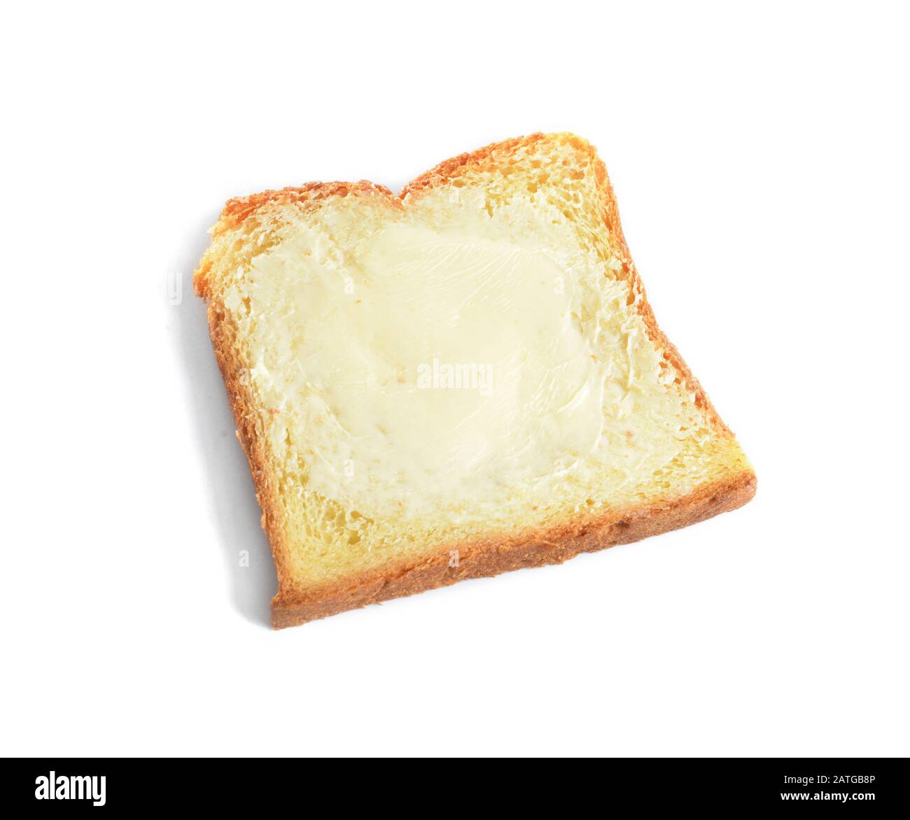 Slice of bread with butter on white background Stock Photo - Alamy