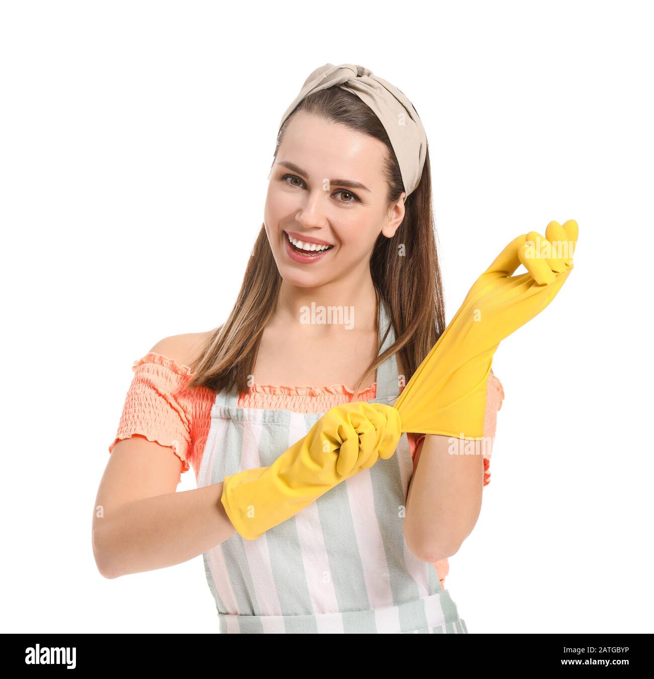 Beautiful young housewife on white background Stock Photo - Alamy