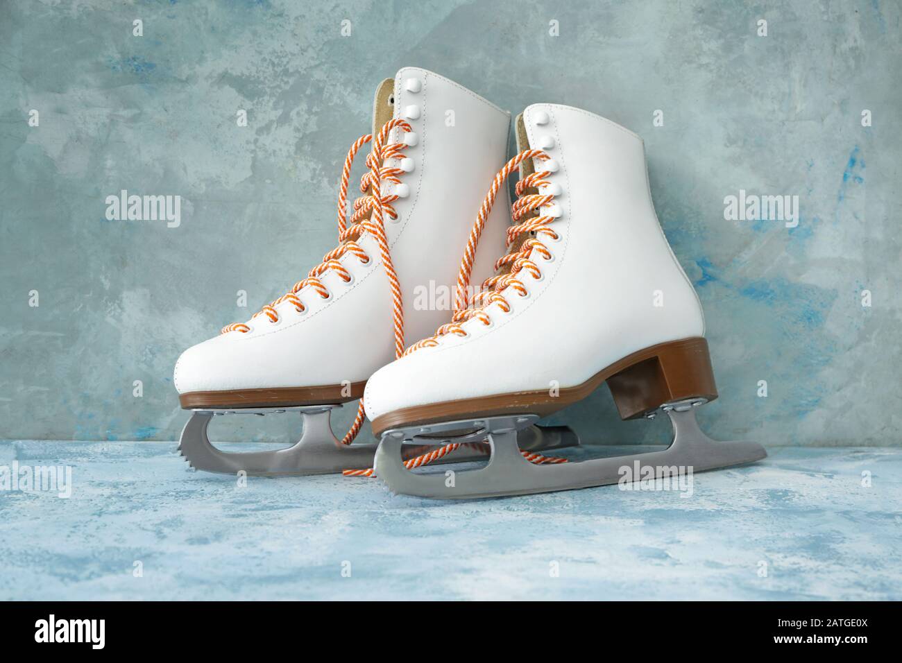 Ice skate shoes on color background Stock Photo