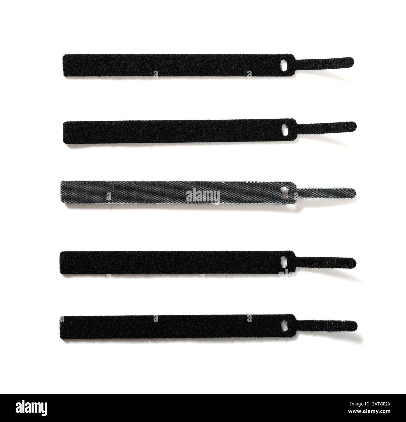 black velcro cable ties on white background Stock Photo