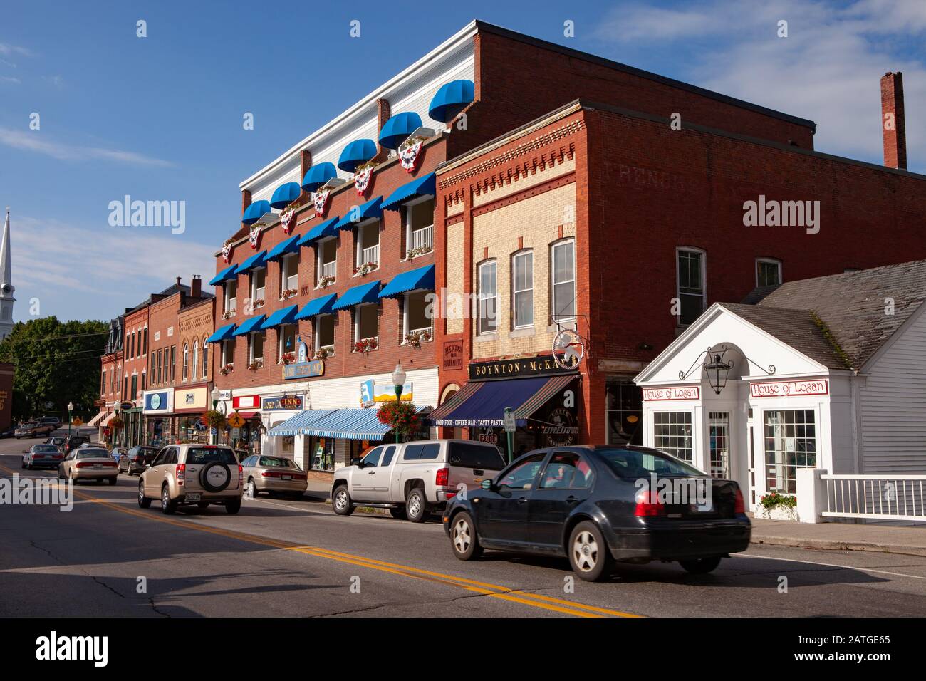 Cars driving along Main Street (Rte 1) in downtown Camden, Maine Stock