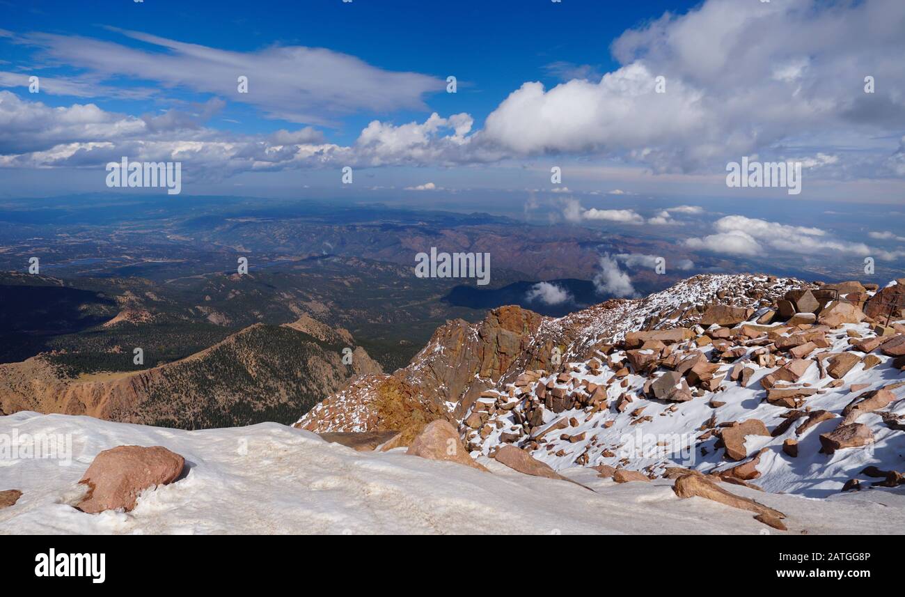 The view of Colorado Springs and the valley beyond from the Pikes Peak summit. Stock Photo