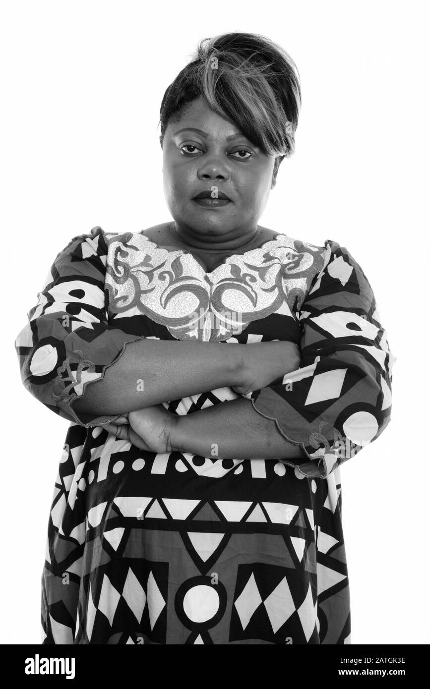 Studio shot of overweight African woman with arms crossed Stock Photo ...