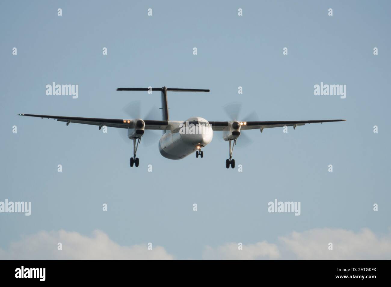Air New Zealand turboprop domestic plane landing at Wellington airport, New Zealand Stock Photo