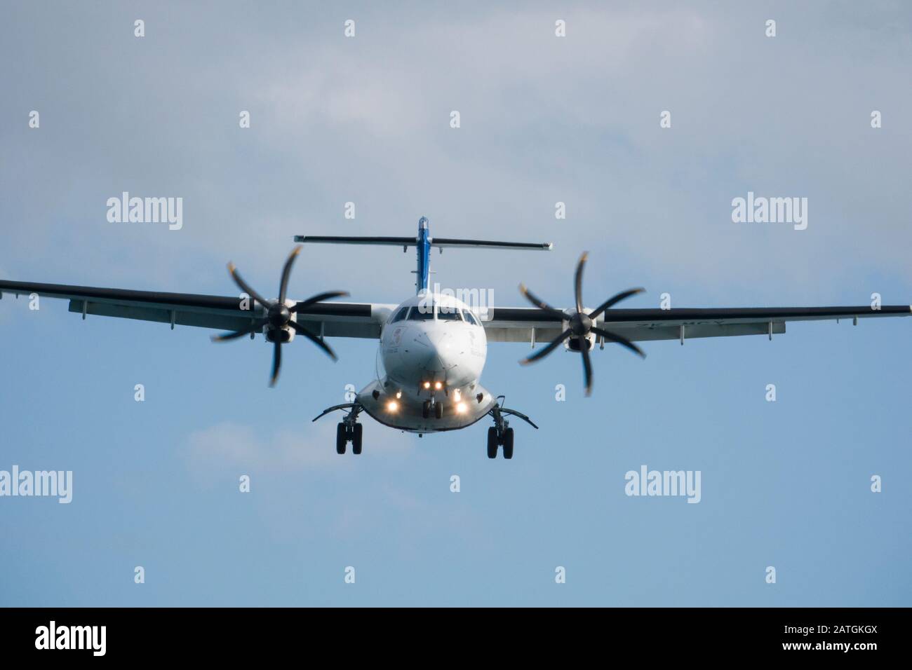 Air New Zealand turbo-prop plane landing at Wellington airport, New Zealand Stock Photo