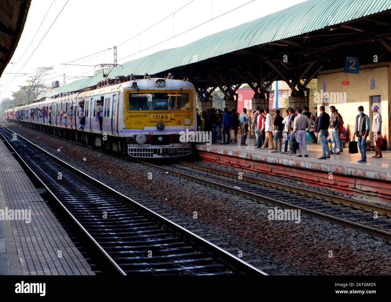 Kolkata, India. 01st Feb, 2020. Passengers wait for a local train at the railway station.700 billion has been sanctioned for developing 150 passengers trains and Express Trains in different Circle of India in the Finance Budget 2020. Credit: SOPA Images Limited/Alamy Live News Stock Photo