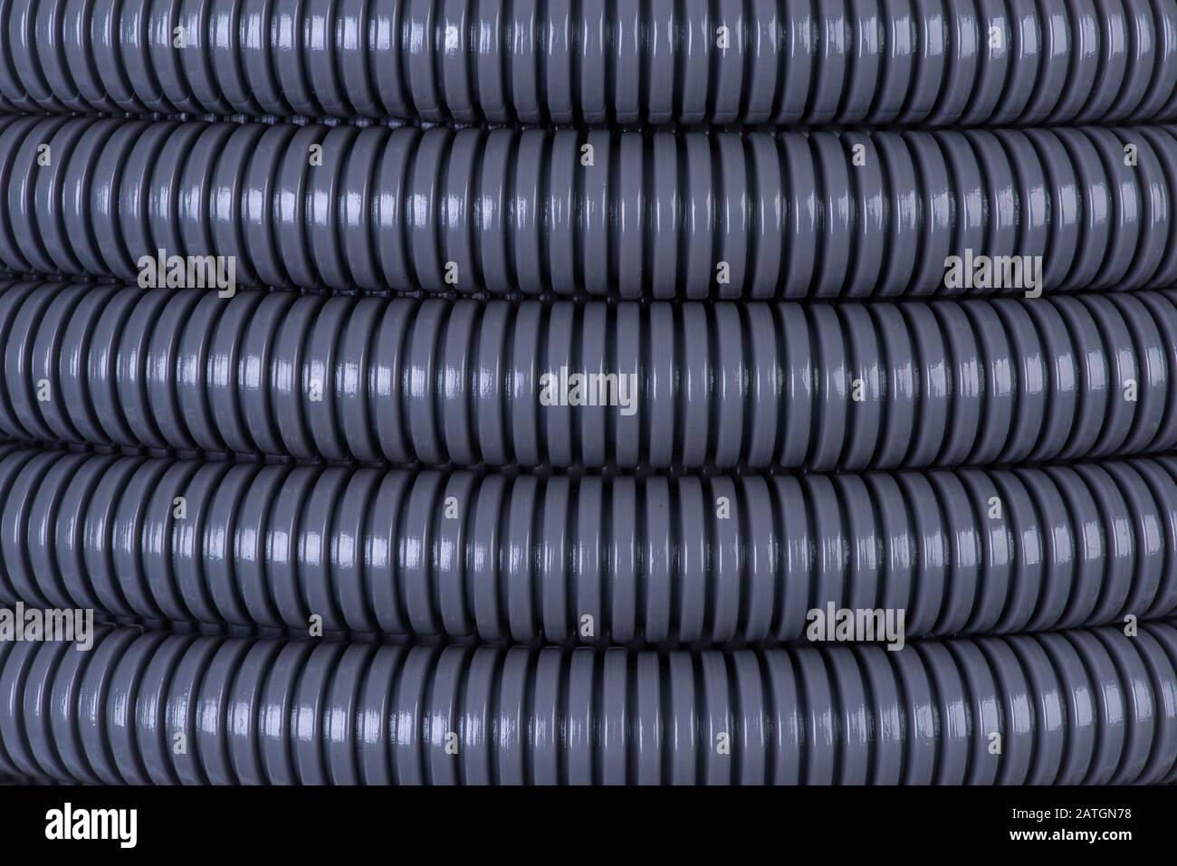 Plastic corrugated pipe tube for electrical installation closeup Stock