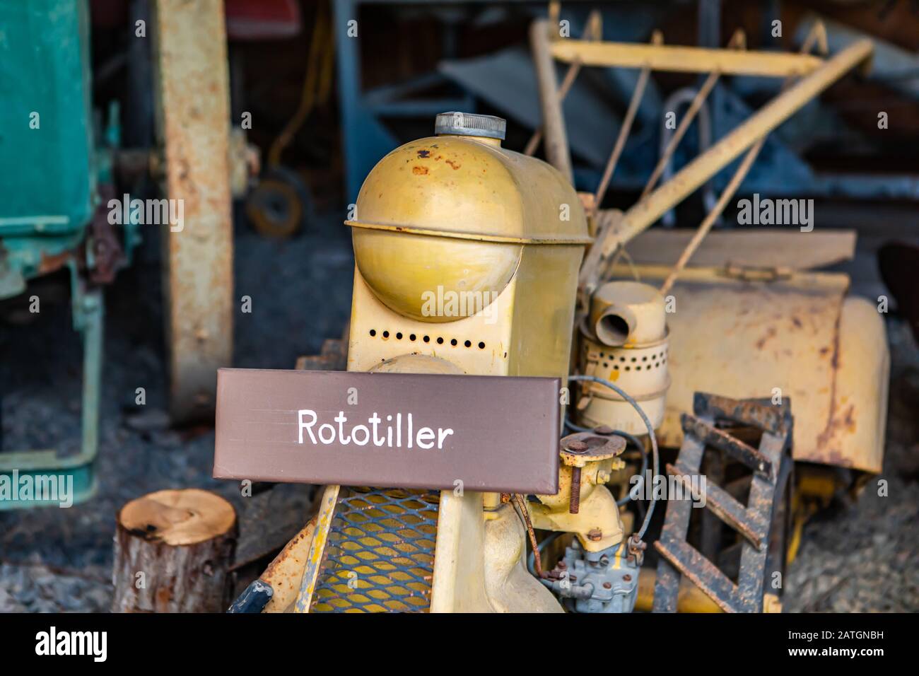 Antique farming technology. An old rustic rototiller machine used for cultivating fields. Agricultural museum in Kootenays, British Columbia, Canada Stock Photo