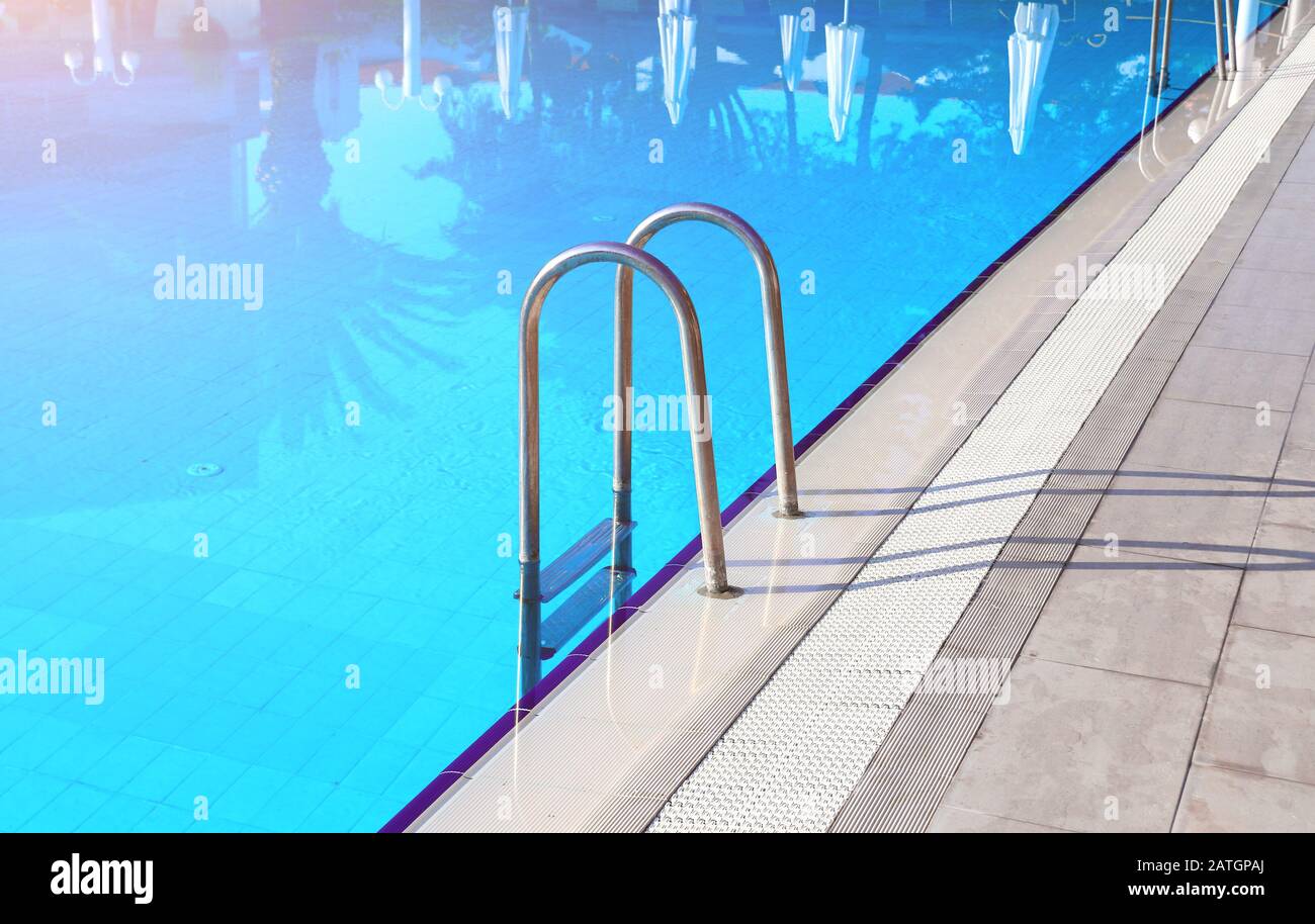 Handrail steps swimming pool hi-res stock photography and images - Alamy