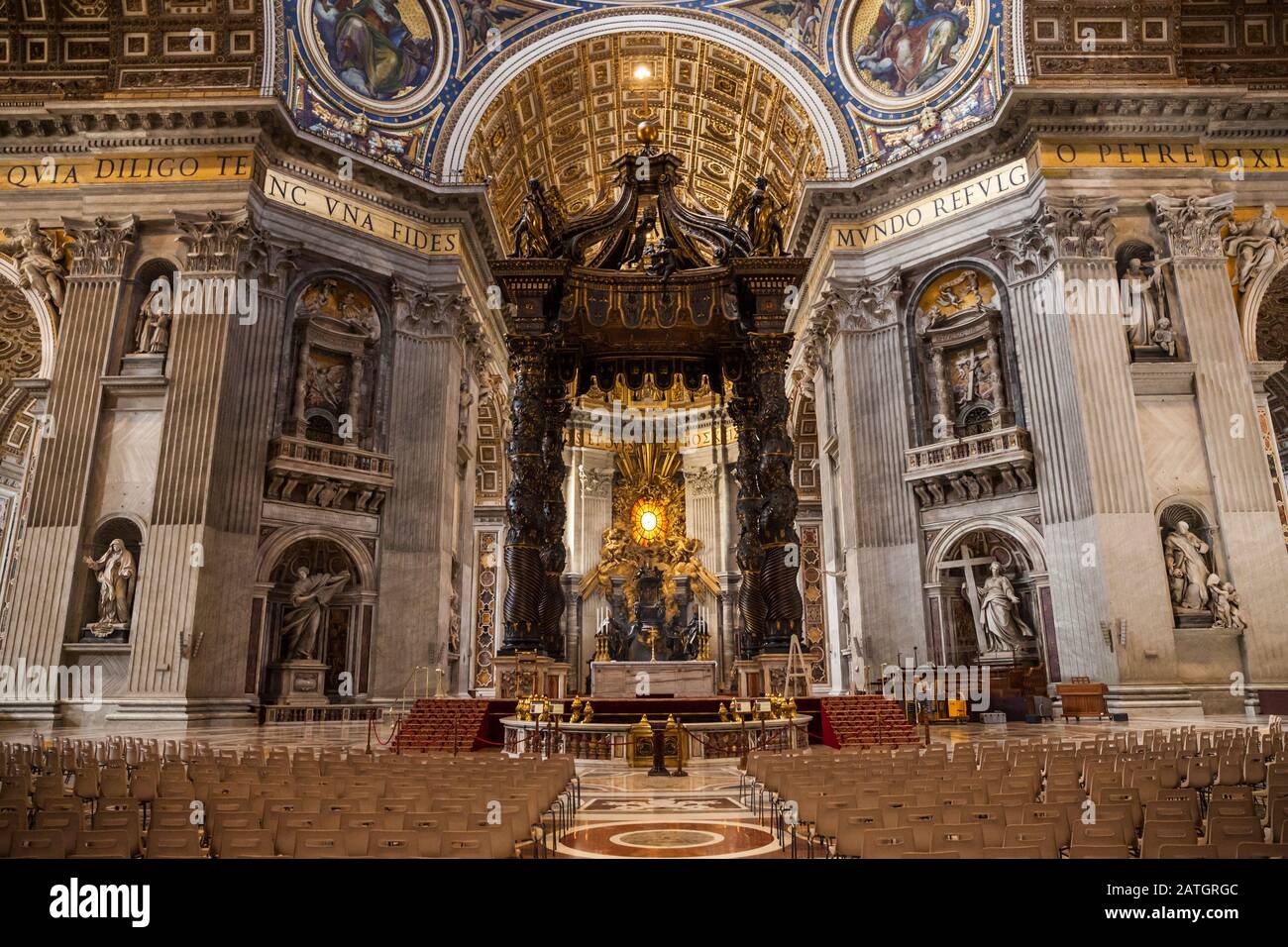 Inside St. Peters basilica looking at the Papal Altar area and Baldacchino, Vatican City, Rome, Italy Stock Photo