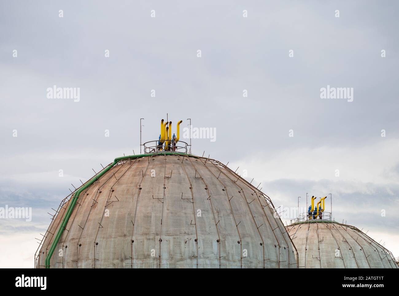 Old gas tanks of spherical form Stock Photo