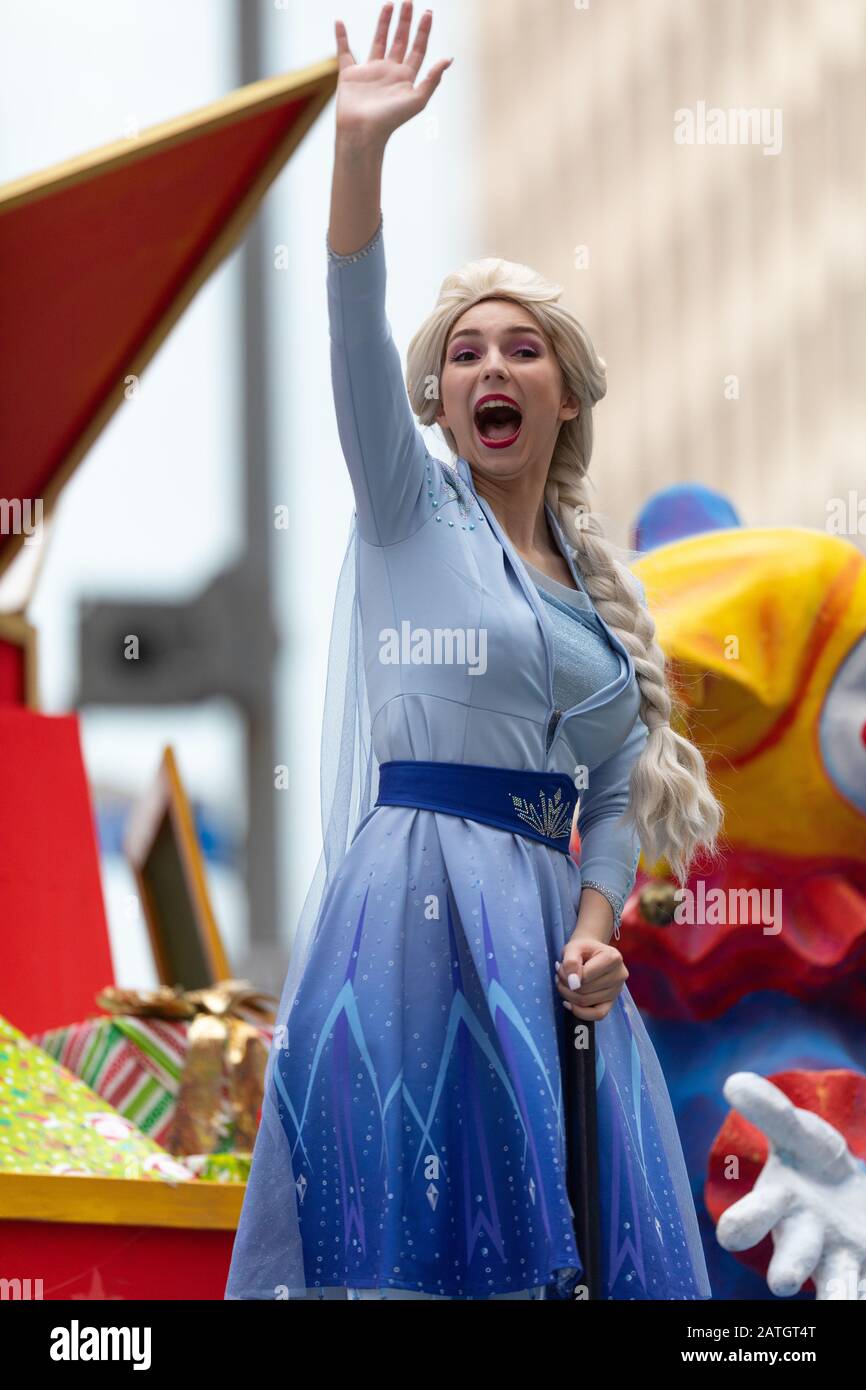 Houston, Texas, USA - November 28, 2019: H-E-B Thanksgiving Day Parade, Women dress up as Elsa, Frozen movie character, waving at the spectators Stock Photo