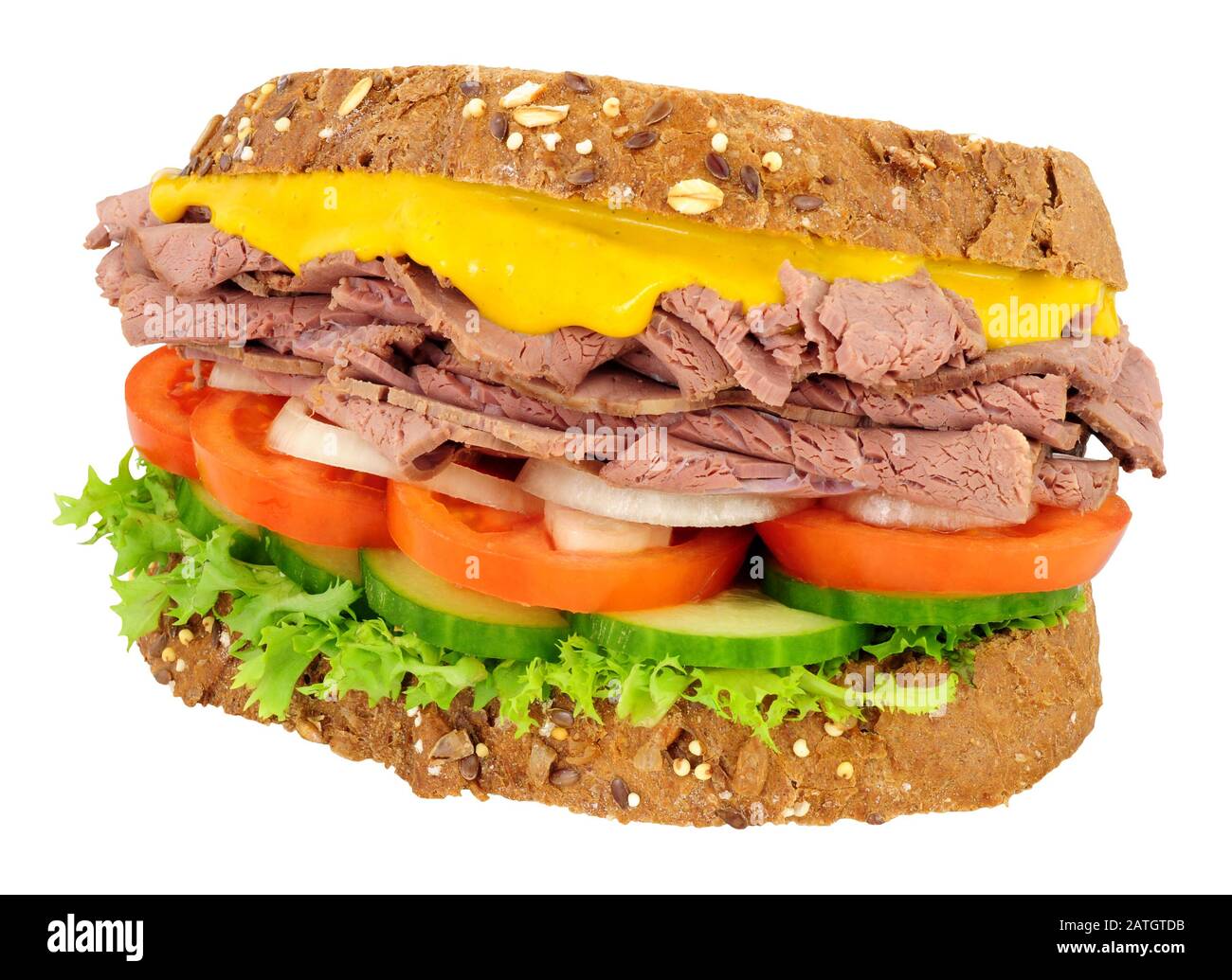Roast beef sandwich with salad and English mustard isolated on a white
