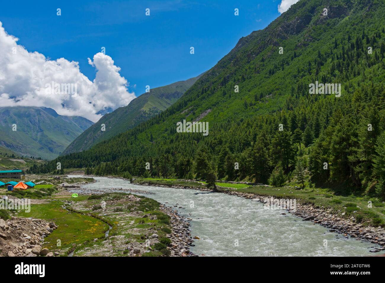 Tents by side of Glacier River through Chitkul Village, Himachal ...
