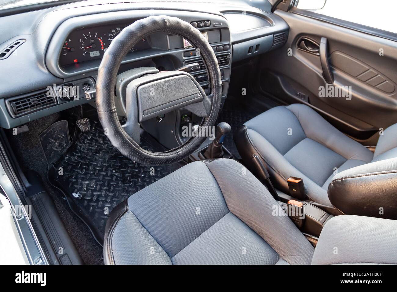 Novosibirsk, Russia - 02.01.2020: The interior of the car lada 2114 samara with a view of the steering wheel, dashboard, seats and multimedia system w Stock Photo