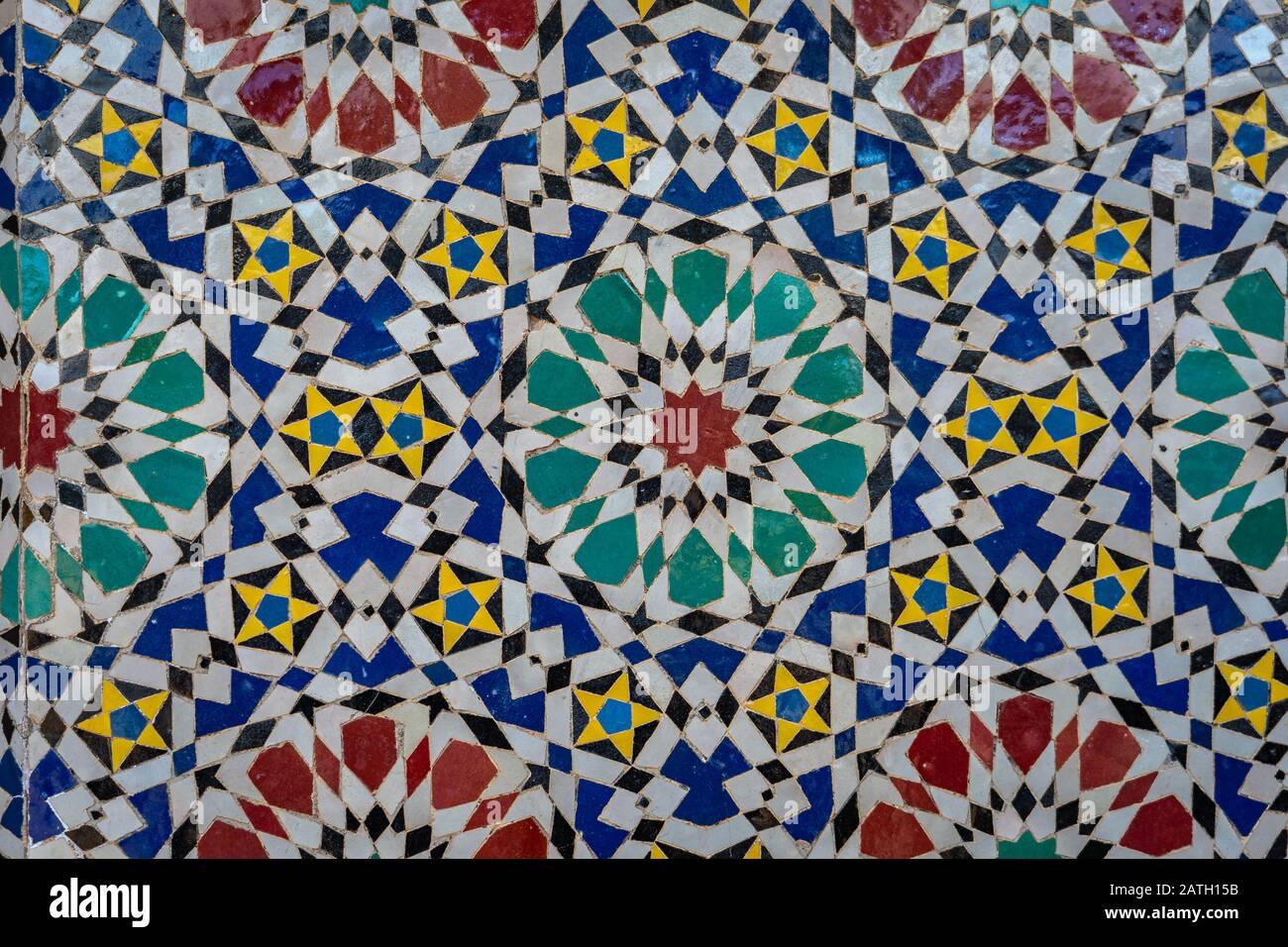 Multi-colored ornamental wall mosaic in Morocco Stock Photo