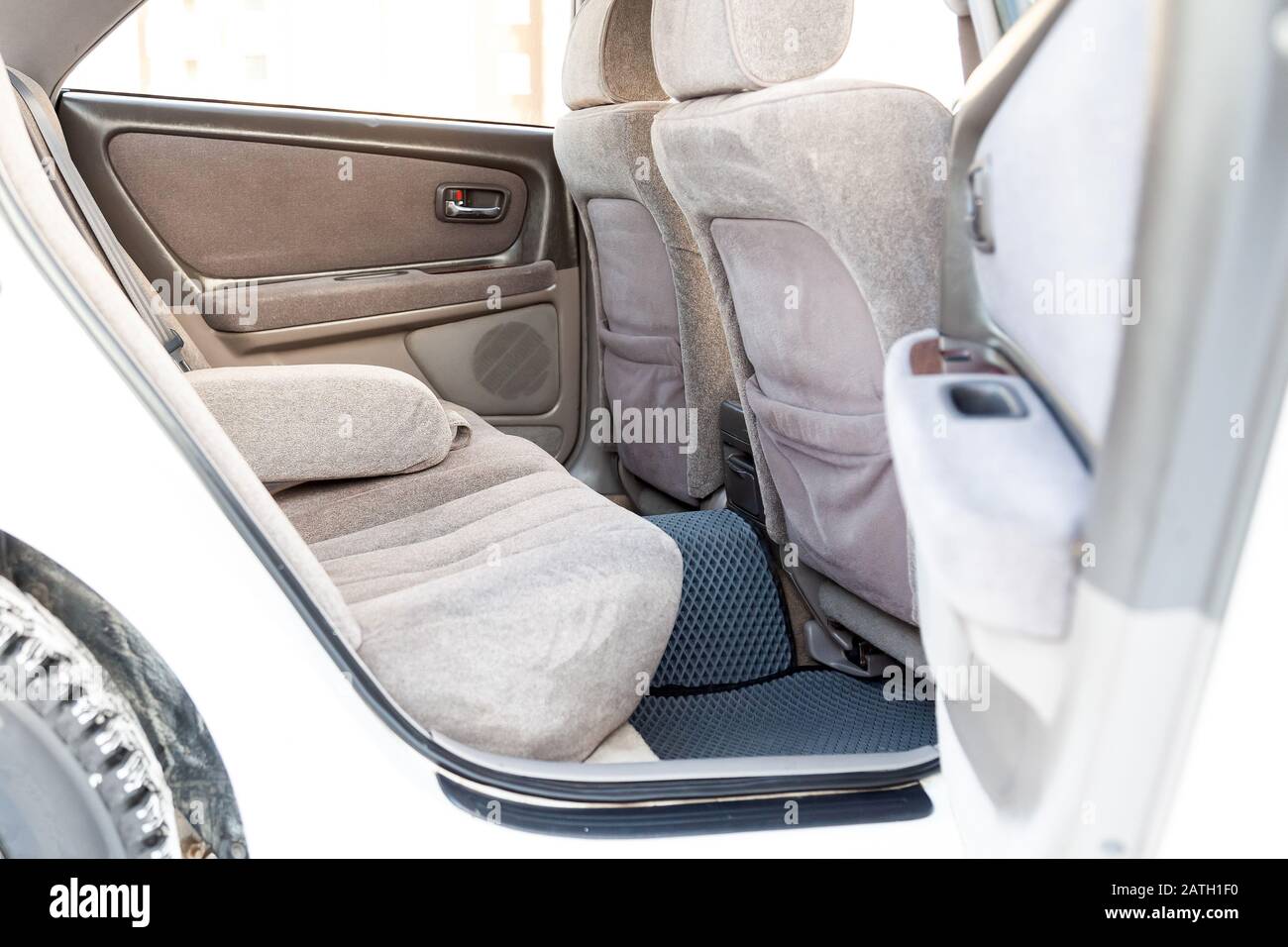 Close Up On Rear Seats With Velours Fabric Upholstery In The