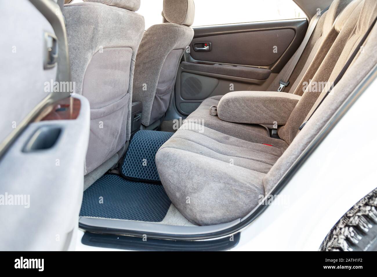 Close Up On Rear Seats With Velours Fabric Upholstery In The
