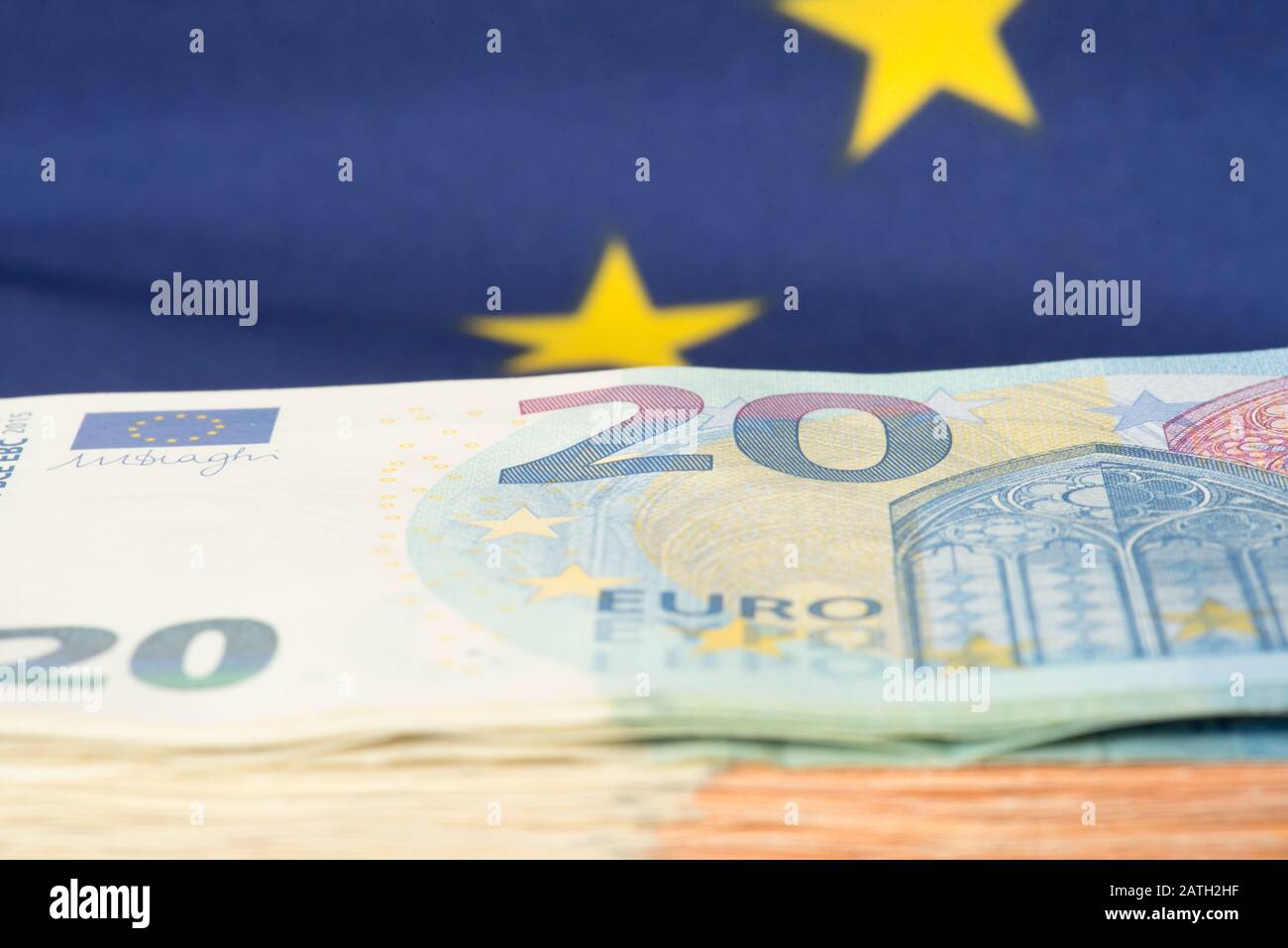 Euro bills and European Union flag Stock Photo