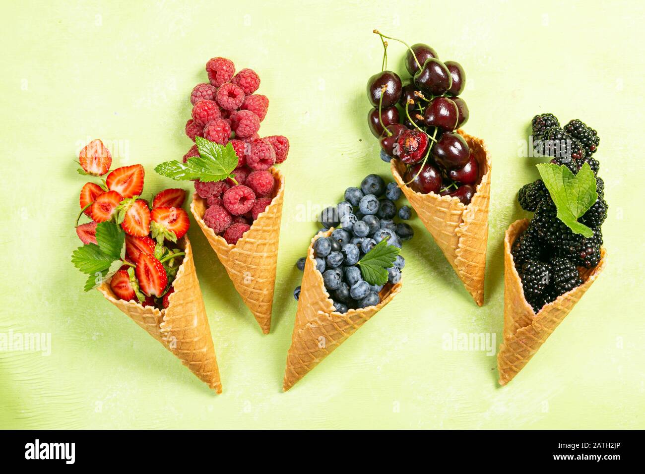 Selection of berries in ice cream cones Stock Photo