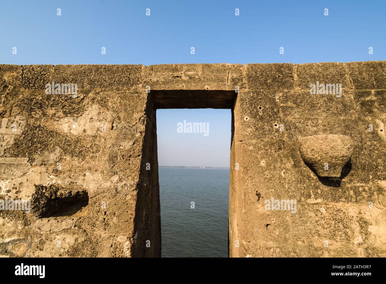 Details on the walls of the ancient Portuguese built fort by the sea in the island of Diu in India. Stock Photo