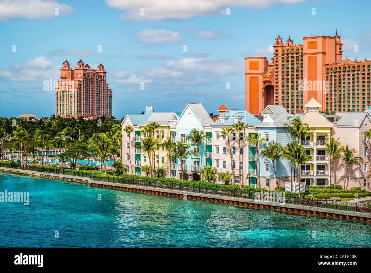 Colorful houses along the waterfront at the ferry terminal of Paradise Island, Nassau, Bahamas. Stock Photo