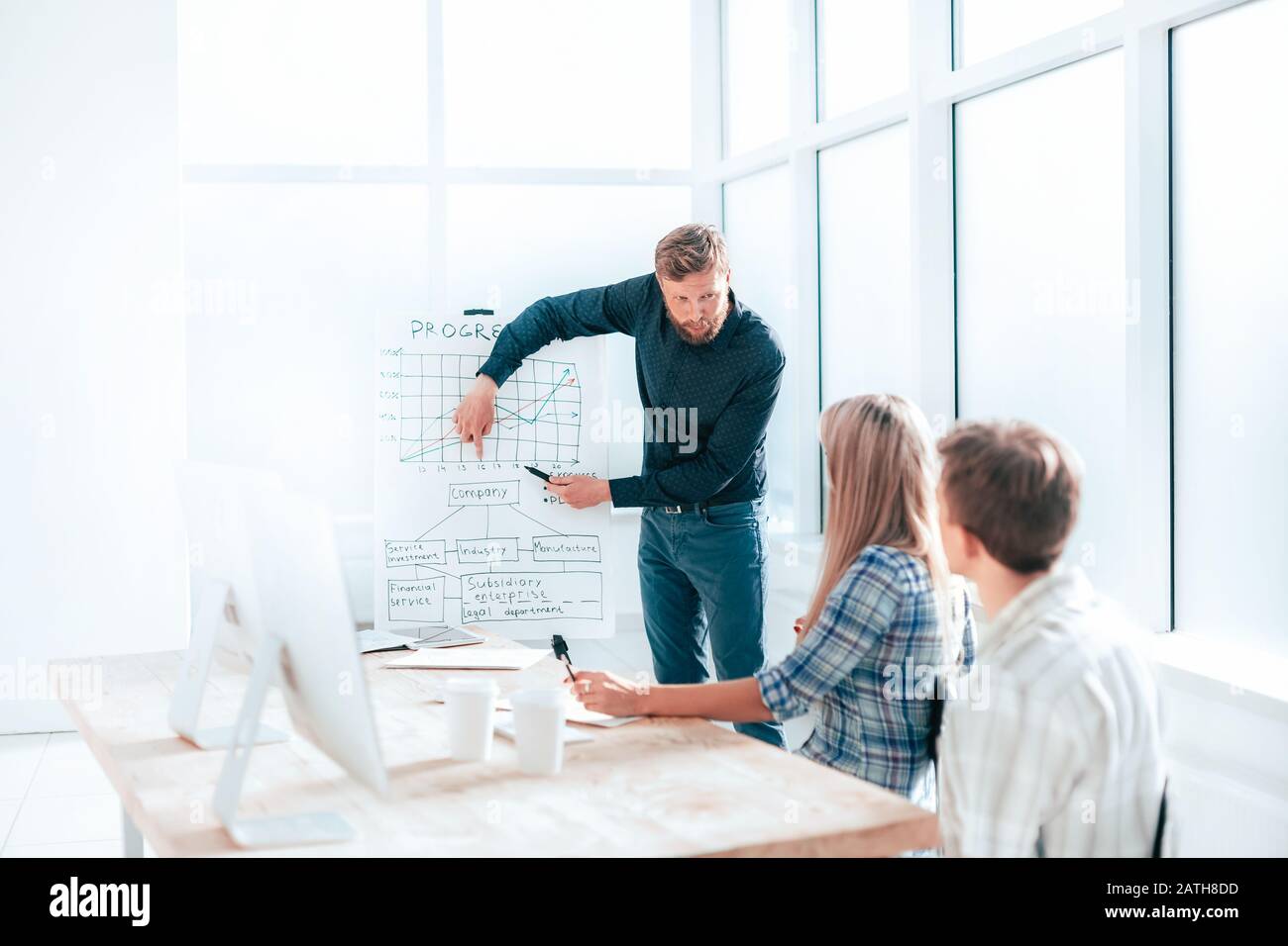 Businessman showing new project hi-res stock photography and images - Alamy