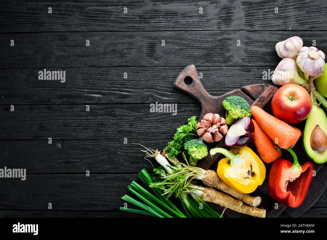 Fresh vegetables. Avocado, cucumber, onion, garlic, tomatoes, carrots