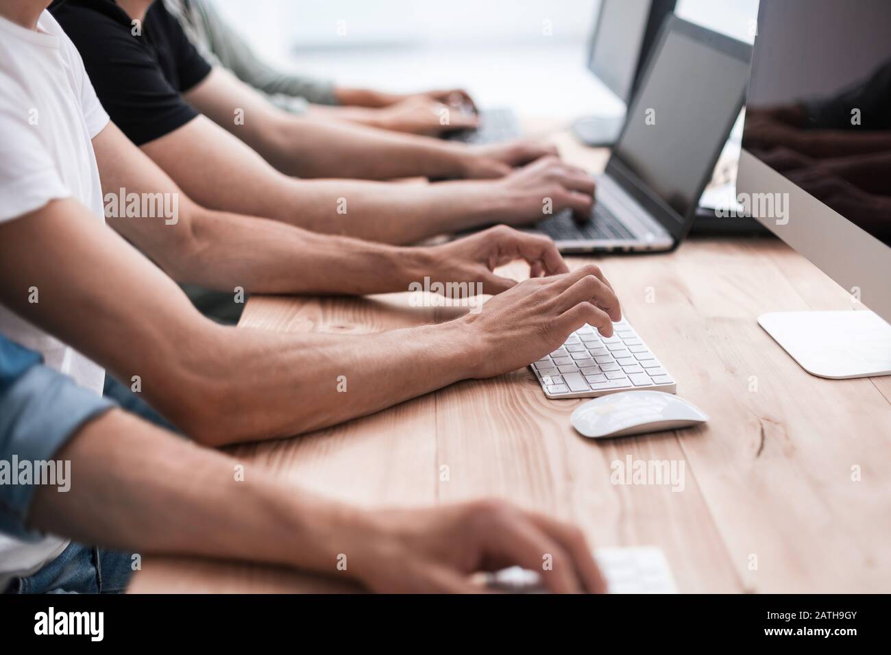 close up. colleagues work on their computers. Stock Photo