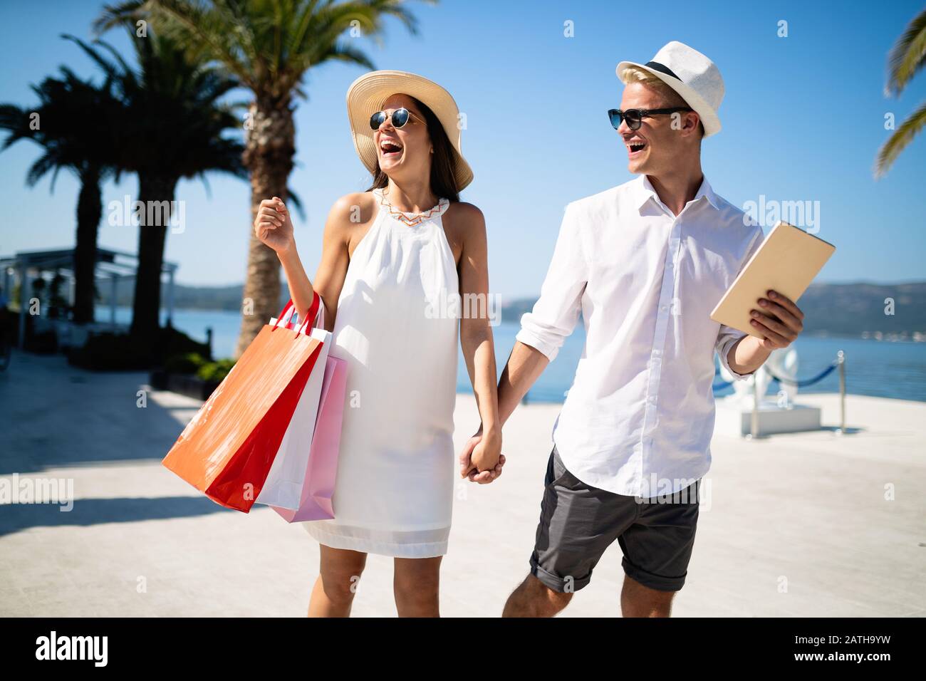 Couple on summer vacation enjoying travel and shopping Stock Photo