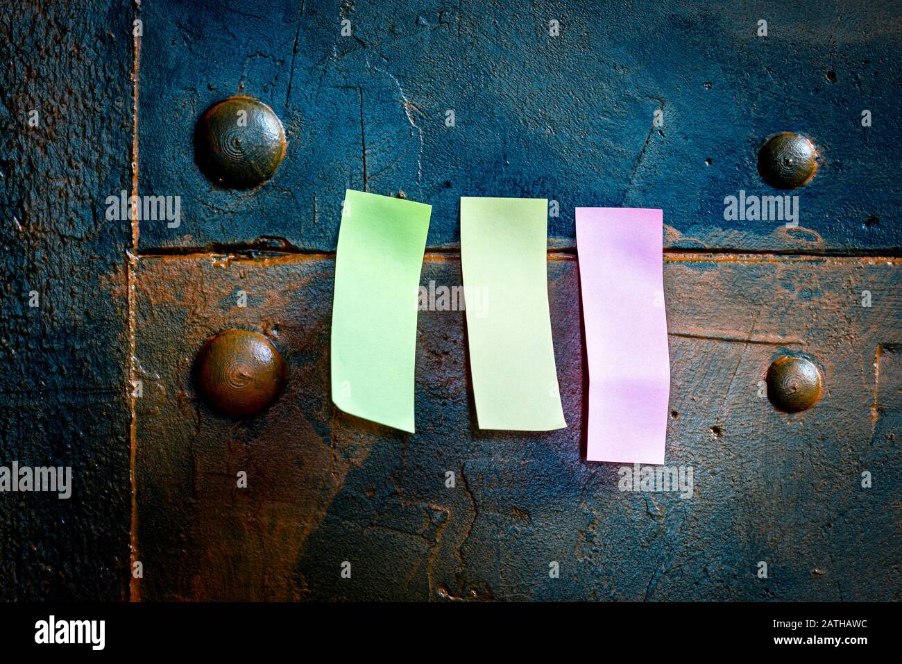 blue metallic pinboard with three memo postit paper with copyspace Stock Photo