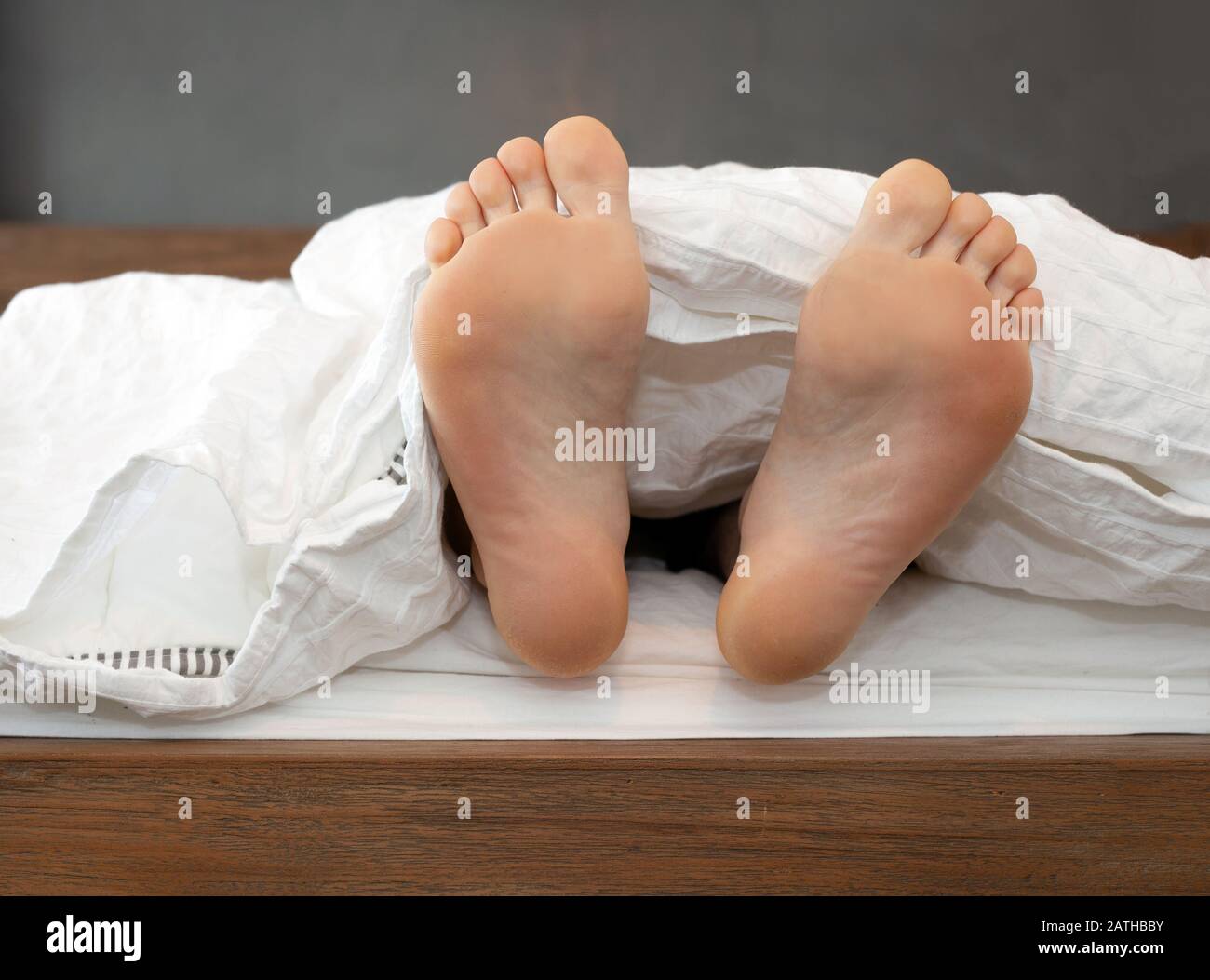 Barefoot male feet sleep hires stock photography and images Alamy