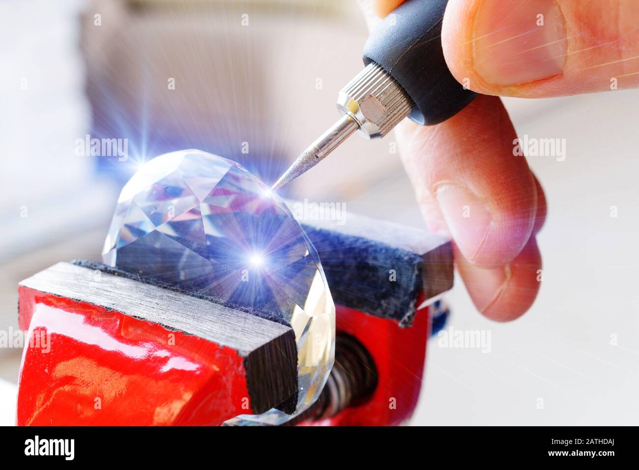 Using a high speed rotary multi tool to engrave ornament on the crystal