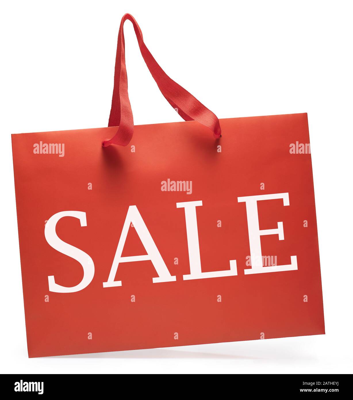 Side view of red color shopping bag. Sale promotion. Clipping path Stock Photo