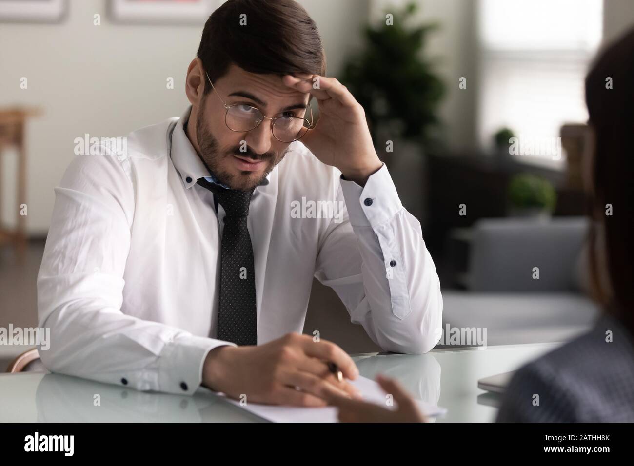 Employer looking at applicant with disbelief failed job interview concept Stock Photo