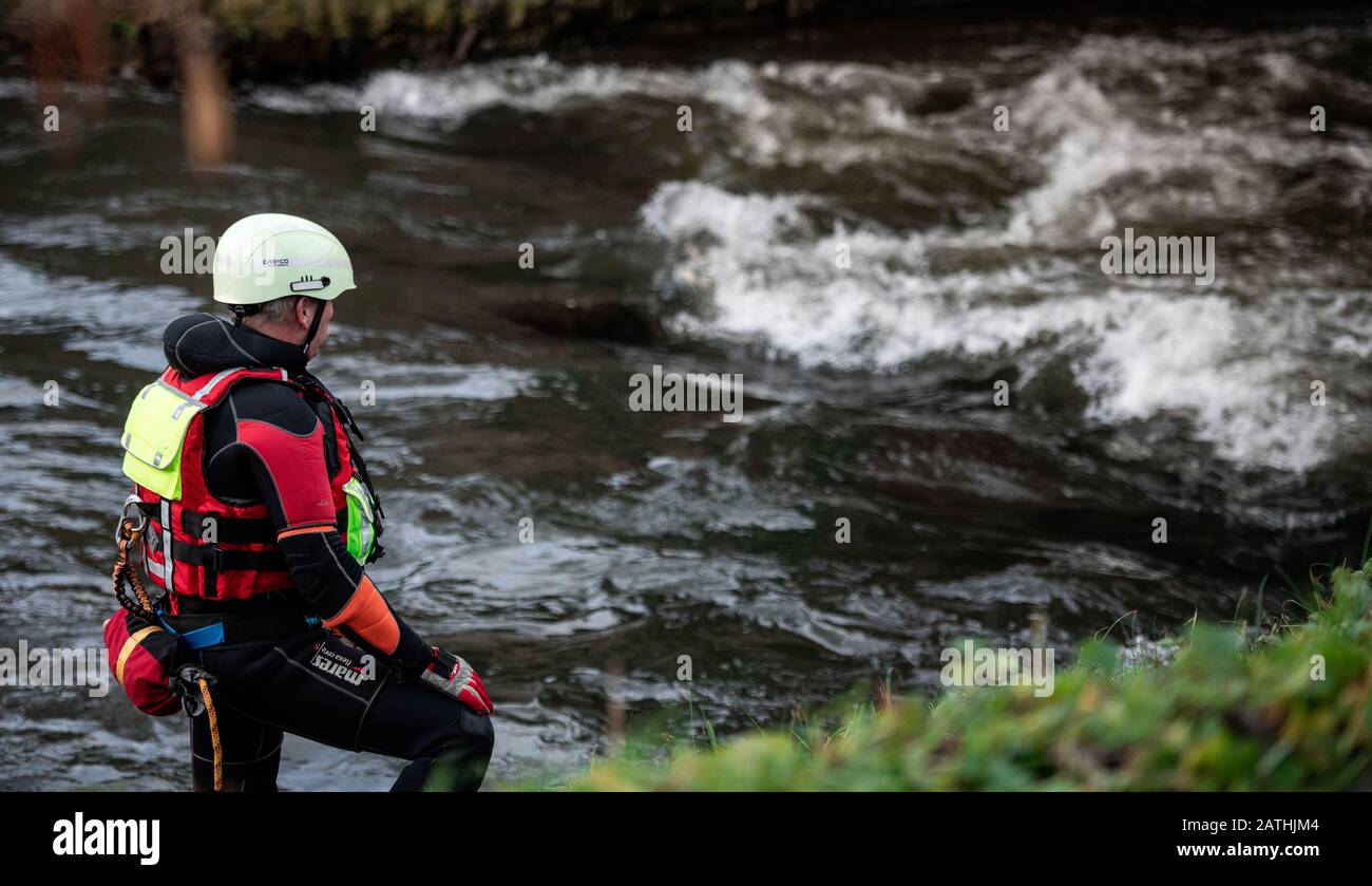 Sauerland, Germany. 3rd Feb, 2020. A fireman stands on the banks of the river Hönne. The search for the missing ten-year-old girl from Menden in the Sauerland region was continued by helicopter on Monday. The latter would once again take a look at the course of the Hönne river - between Menden and the area where it flows into the Ruhr in the direction of Schwerte. The autistic child had walked out of the parents' apartment in an unobserved moment on Saturday - probably in pink pyjamas and barefoot. Credit: dpa picture alliance/Alamy Live News Stock Photo