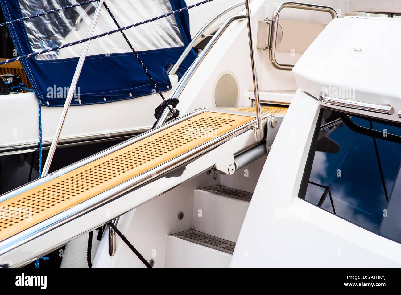 Yacht boarding ladder with rotating platform Stock Photo Alamy