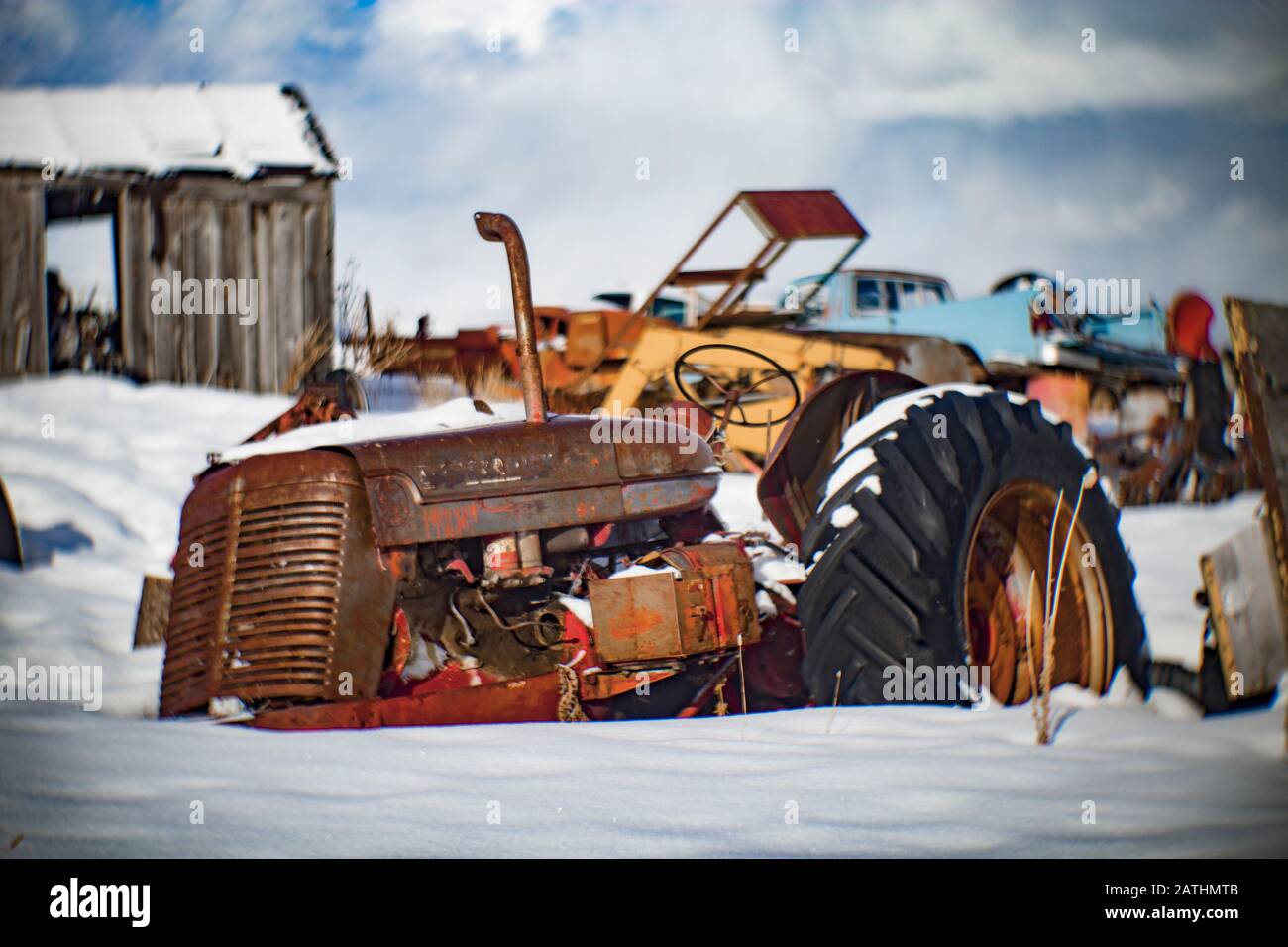 An old 1954 International Mccormick-Deering Super WD-9 diesel powered tractor in the snow, in Porter's Corner, southwest of Philipsburg, Montana, bell Stock Photo
