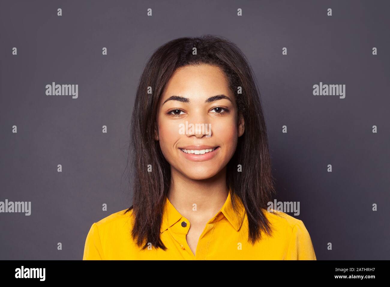 Cute friendly black girl student smiling, close up portrait Stock Photo ...