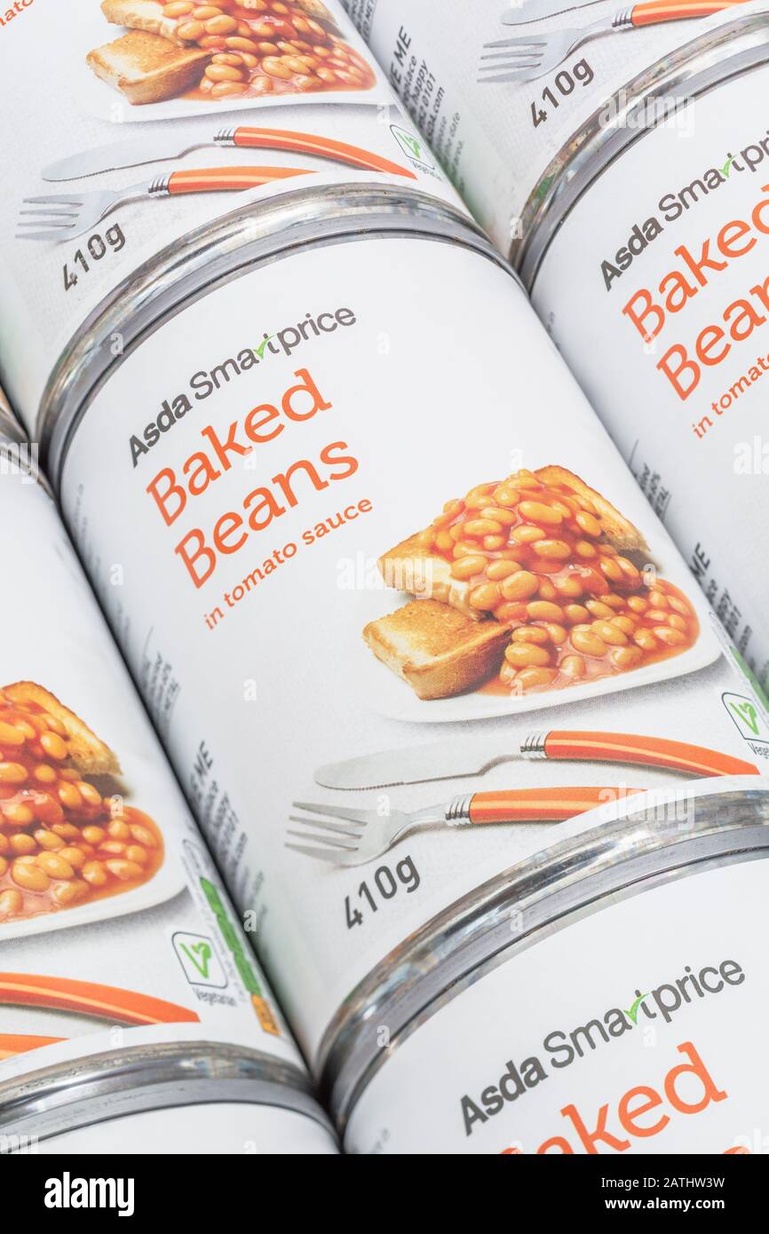 Close up shot of ASDA value baked beans. Common everyday food for many households on limited budgets, and common student fayre. Food packaging. Stock Photo