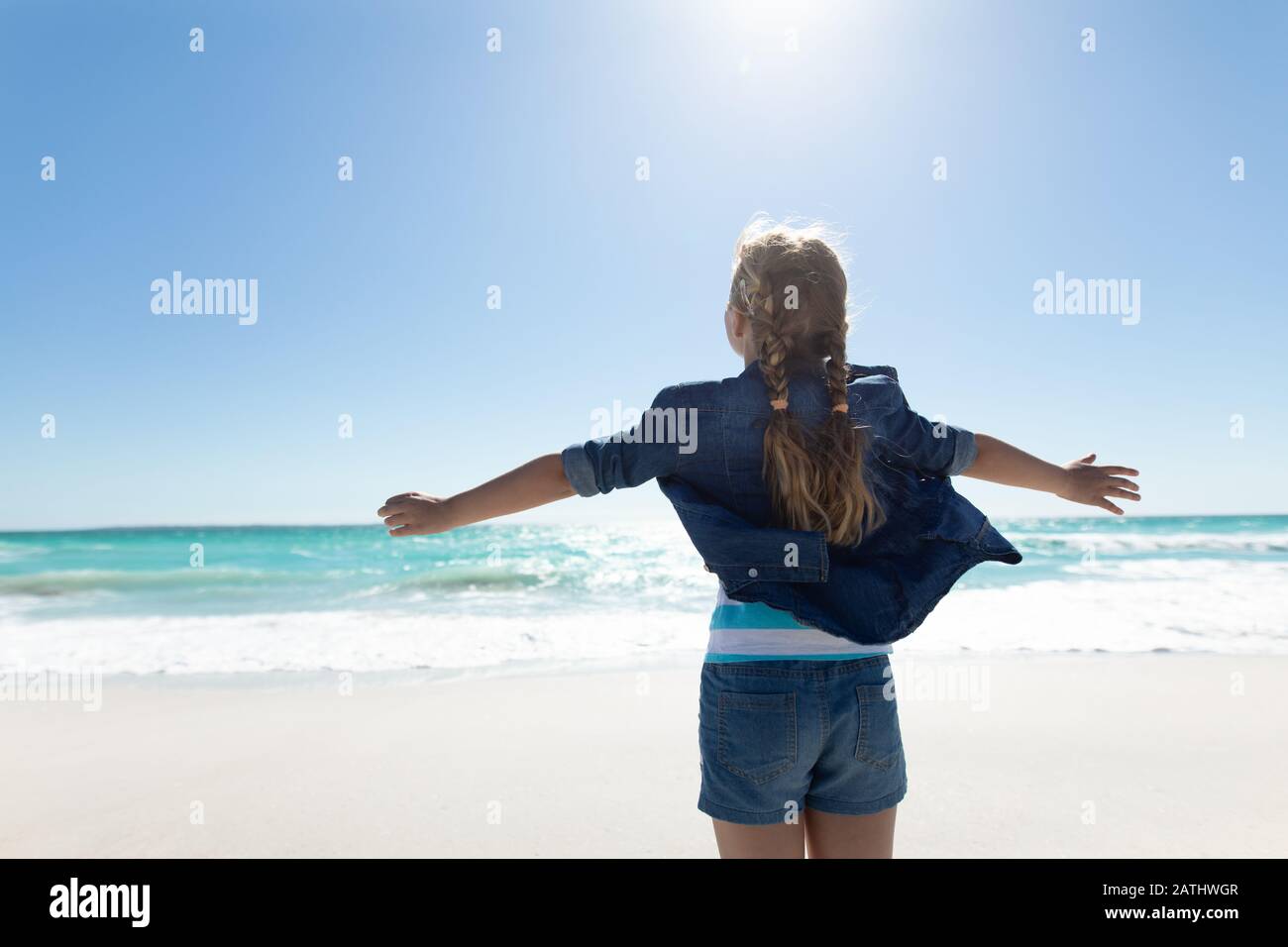 Girl enjoying free time at the beach Stock Photo