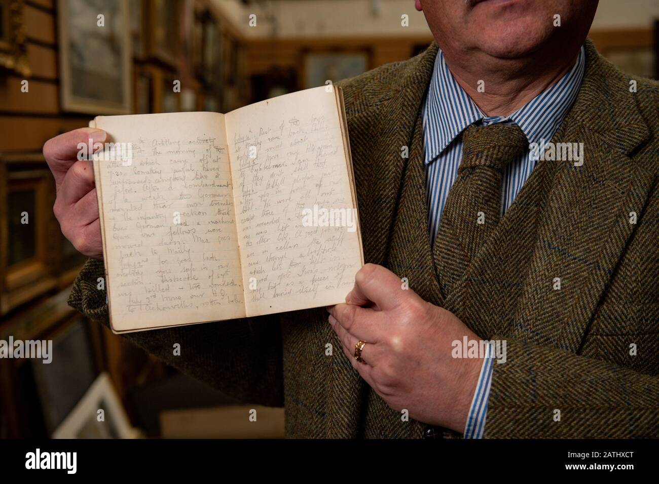 Militaria expert Adrian Stevenson of Hansons Auctioneers holds a battered diary written by a soldier during the Battle of the Somme in the First World War has been discovered in a Midlands barn. Picture date: Monday February 3, 2020. Written in pencil more than a century ago by Private Arthur Edward Diggens, it includes an entry from the first day of the battle - July 1, 1916. Photo credit should read: Jacob King/PA Wire Stock Photo